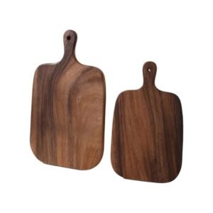 Wooden cutting board with handle on a kitchen counter